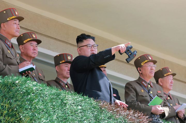 This undated picture released from North Korea's official Korean Central News Agency on April 14 shows North Korean leader Kim Jong-Un (center) inspecting the "Dropping and Target-striking Contest of KPA Special Operation Forces - 2017" at an undisclosed location in North Korea. He has overseen a special forces commando operation, state media said on April 13, as tensions soar with Washington over Pyongyang's nuclear program.
