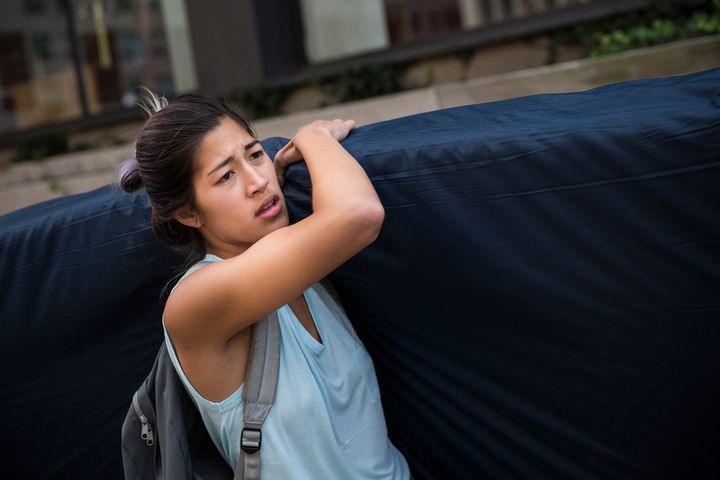 Emma Sulkowicz, a former visual arts student at Columbia University, carried a mattress in protest of the university's lack of action after she reported being raped during her sophomore year on September 5, 2014 in New York City. 