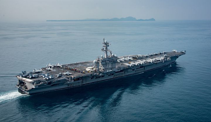 U.S. aircraft carrier USS Carl Vinson travels through the Sunda Strait