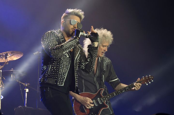 Brian May credits Adam Lambert's showmanship for keeping Queen's magic alive, 20 years after the loss of Freddie Mercury