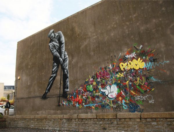 Martin Whatson pays an homage to graffiti writers and taggers, from whom much of today’s Street Art and mural festivals evolved. “Luckily we got one of the local guys who came past,” says Aberdeen photographer and expert art blogger Jon Reid, “He left a tag in the bottom right hand side. So at least he managed to get a bit of ‘local’ in as well.” 