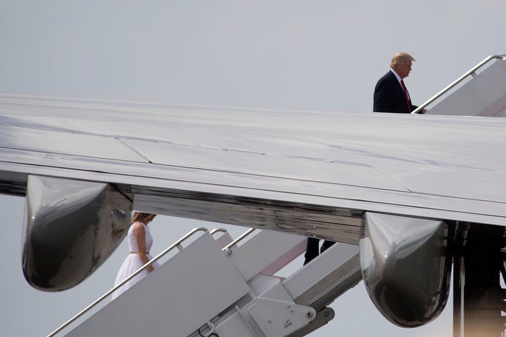 U.S. President Donald Trump and first lady Melania Trump board Air Force One in West Palm Beach, Florida, on April 16.