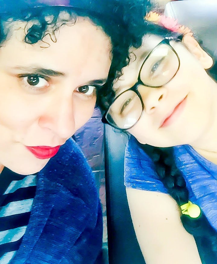 The author and her 9-year-old daughter, who has high-functioning autism.