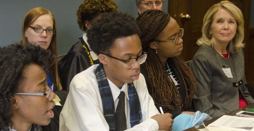 Anne Goddard, right, listens as Zion Blount, 17, tells Mississippi Sen. Thad Cochran’s staff her concerns about the proposed