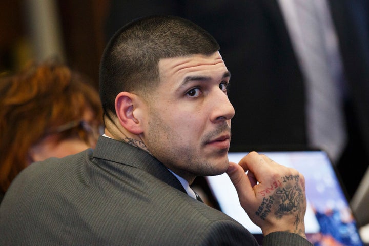 Former New England Patriots tight end Aaron Hernandez sits at the defense table during his double murder trial in Boston on M