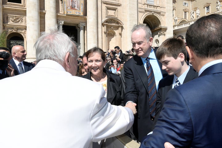 Fox News Channel host Bill O'Reilly shakes hand with Pope Francis during the Wednesday general audience in Saint Peter's squa