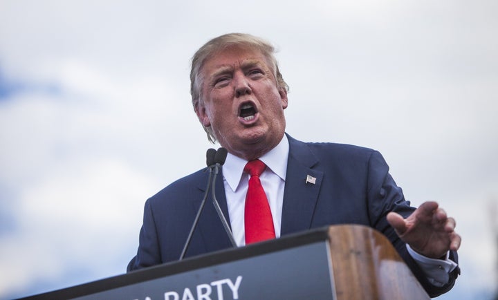 Donald Trump speaks during a rally held at the United States Capitol to speak out against President Obama's nuclear agreement with Iran on September 9, 2015.