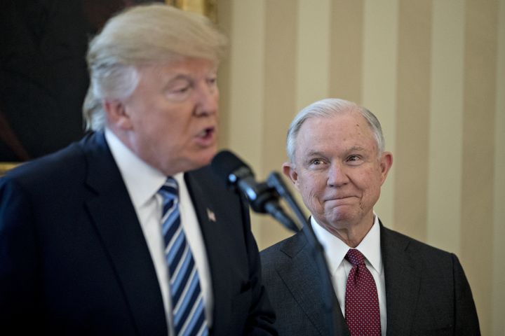 Jeff Sessions listens as President Donald Trump speaks before Sessions is sworn in as U.S. attorney general on Feb. 9.