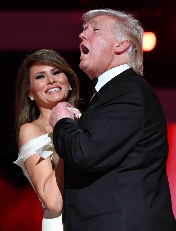  Several balls were among the events paid for by Trump’s Inaugural Committee. Here, the freshly minted president sings along to “My Way” while dancing with his wife Melania. 