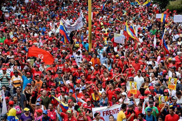 Supporters of Venezuelan President Nicolas Maduro take part in a counter-demonstration in Caracas. 