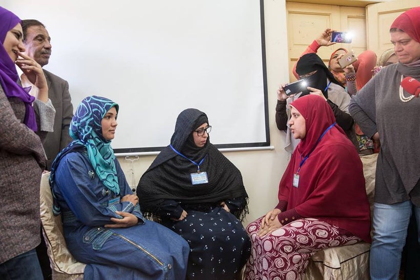 Women during a role-play highlighting issues faced by them, including FGM.