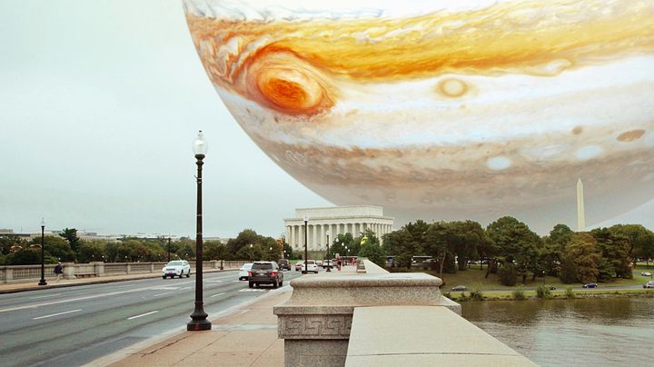In “Miniverse,” the giant planet Jupiter hovers over the Mall in Washington, D.C.