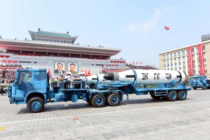Military vehicles carry missiles during a military parade marking the 105th birth anniversary of country's founding father Kim Il Sung,