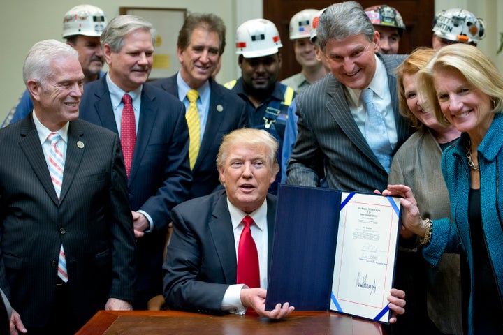 Trump signed H.J. Res. 38, which repealed the Stream Protection Rule, in the Roosevelt Room of the White House on Feb. 16, 2017.