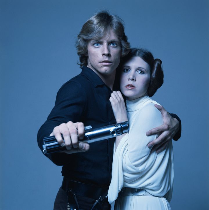 Mark Hamill in character as Luke Skywalker, with co-star Carrie Fisher