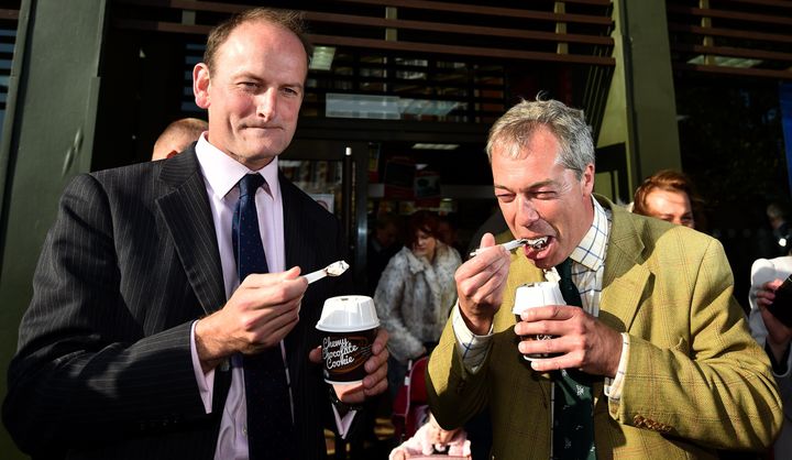 Douglas Carswell and Nigel Farage eat a McFlurry while on the campaign trail in 2014