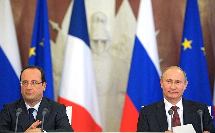 Vladimir Putin, here with French President Francois Hollande, has big plans for Europe.