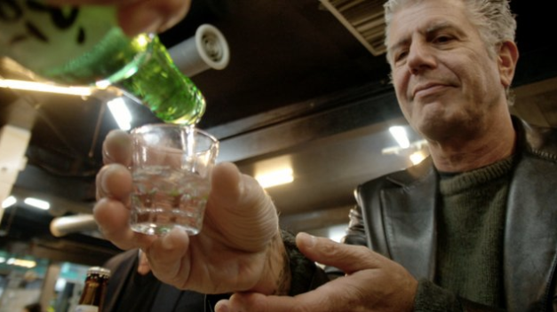 Anthony Bourdain being served a shot on Parts Unknown.