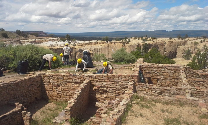 Corpsmembers with Southwest Conservation Corps serve at El Morro National Monument. 