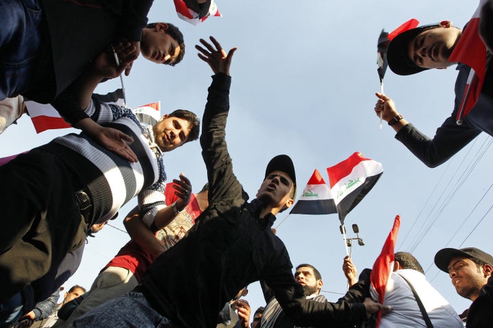 Supporters of Iraqi cleric Moqtada al-Sadr demonstrate in Baghdad on Feb. 8 to demand reforms from Iraq's leading partie