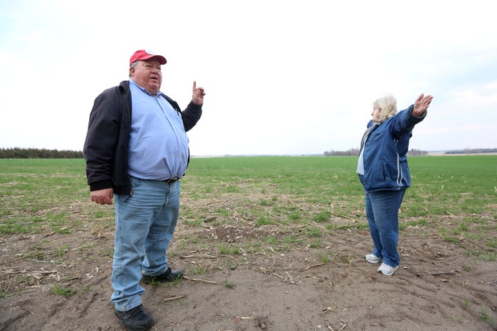 Art and Helen Tanderup show where the Keystone XL pipeline would cut through the farm near Neligh, Nebraska, that's been in H
