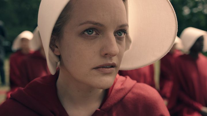 Elisabeth Moss as Offred.