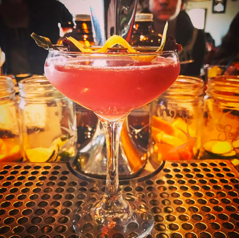 Mezcal, bourbon cherry syrup, lime and peach.