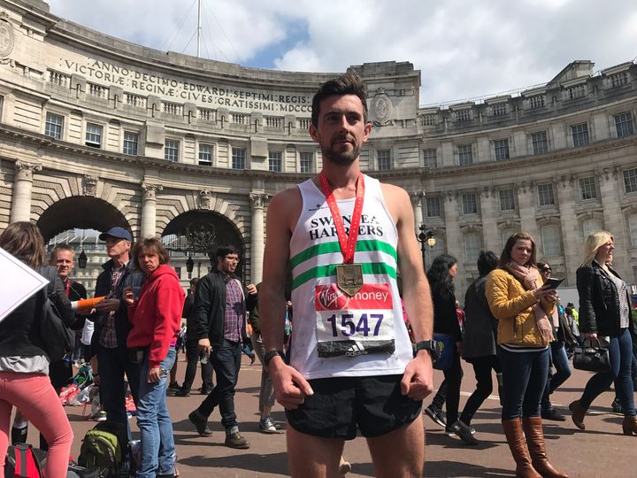 Matthew Rees, 29, from Swansea, who helped carry an exhausted runner over the marathon finishing line.