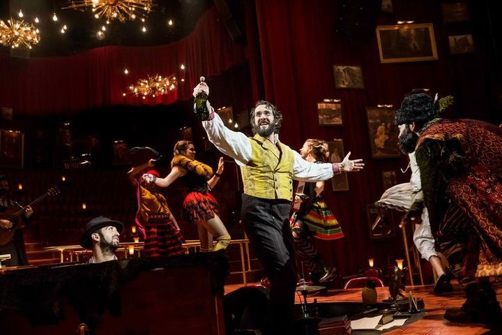 Pierre (Josh Groban) and Balaga (Paul Pinto) party it up while swirling around the audience in The Great Comet
