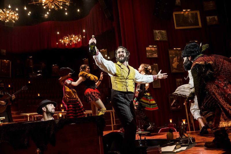 Pierre (Josh Groban) and Balaga (Paul Pinto) party it up while swirling around the audience in <em>The Great Comet</em>