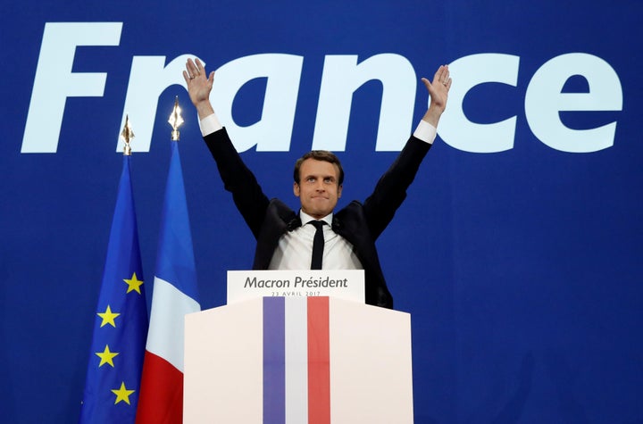 Emmanuel Macron, head of the political movement En Marche!, or Onward!, and candidate for the 2017 French presidential election, celebrates after partial results came in from the first round, at the Parc des Expositions hall in Paris on April 23, 2017.