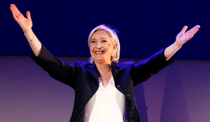 Marine Le Pen, French National Front political party leader and candidate for the French presidential election, celebrates after early results in the first round came in on April 23.