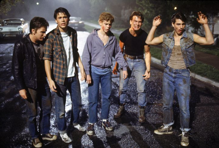 American actors Emilio Estevez, Rob Lowe, Thomas C. Howell, Patrick Swayze, and Tom Cruise on the set of "The Outsiders," directed by Francis Ford Coppola.