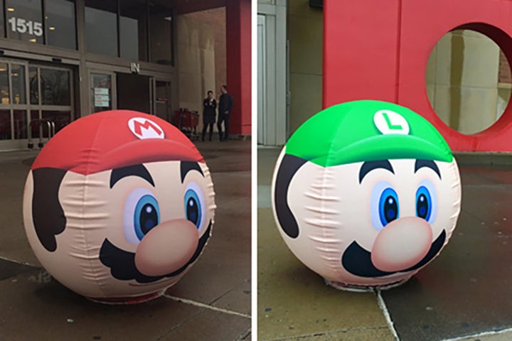 The bollards in front of the stores are now Mario themed too.