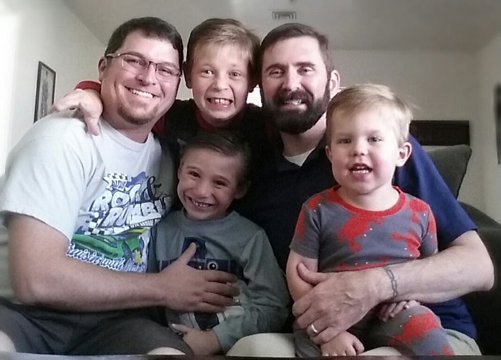 Greg and Kenny with their three sons