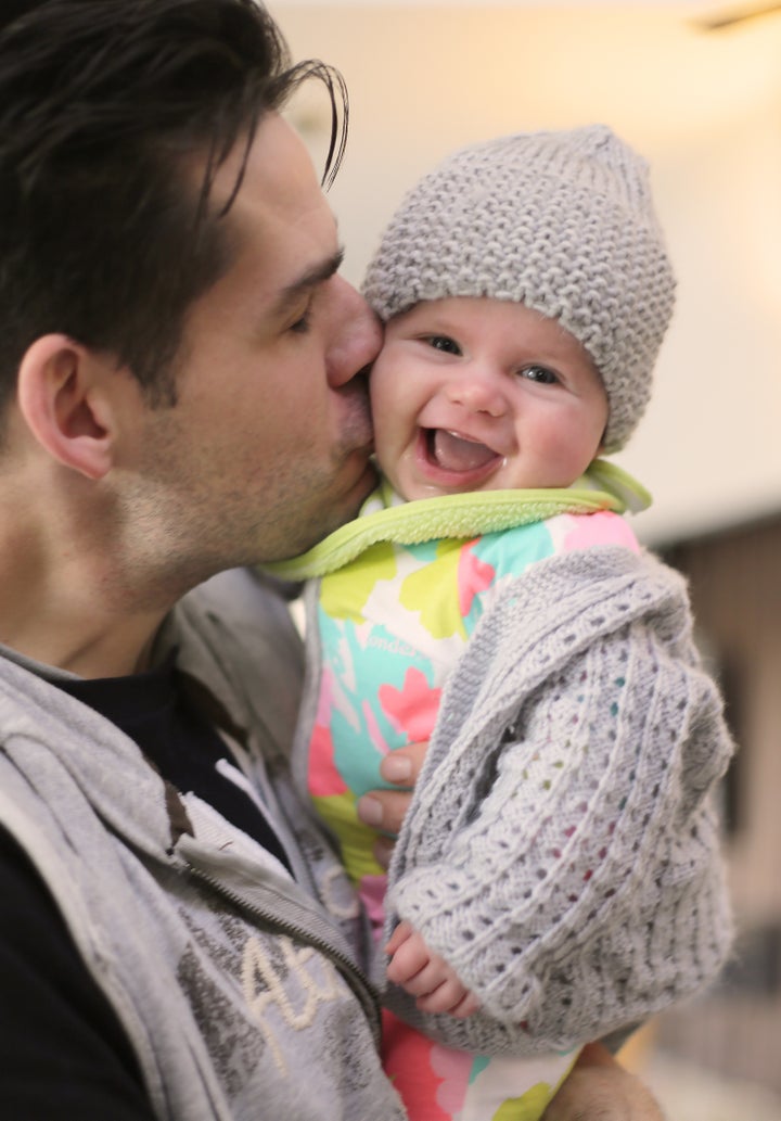 Nathan kissing Olive