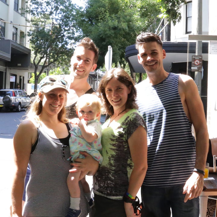 Bianca (left) holds Olive with Alison, Michael (back left) and Nathan