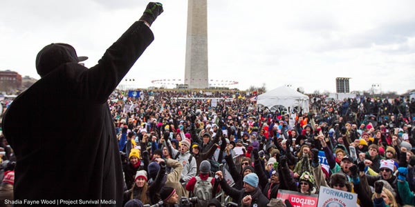 <p>Rev. Yearwood speaks to a crowd of climate activists in Washington, D.C.</p>