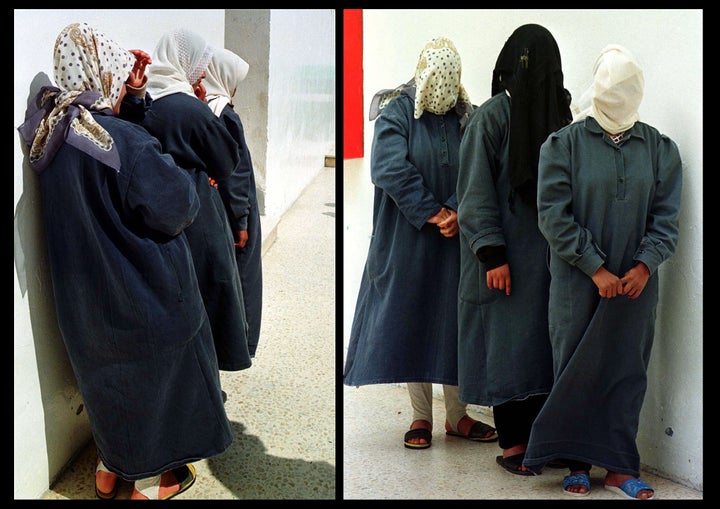 Three Jordanian women, their faces covered to hide their identity, were raped, assaulted or had relationships outside marriage, and are kept in jail to protect them from "honor killing" by their families. (File: March 1999)
