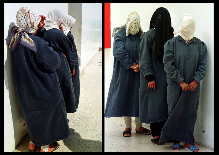 Three Jordanian women, their faces covered to hide their identity, were raped, assaulted or had relationships outside marriage, and are kept in jail to protect them from "honor killing" by their families. (File: March 1999)