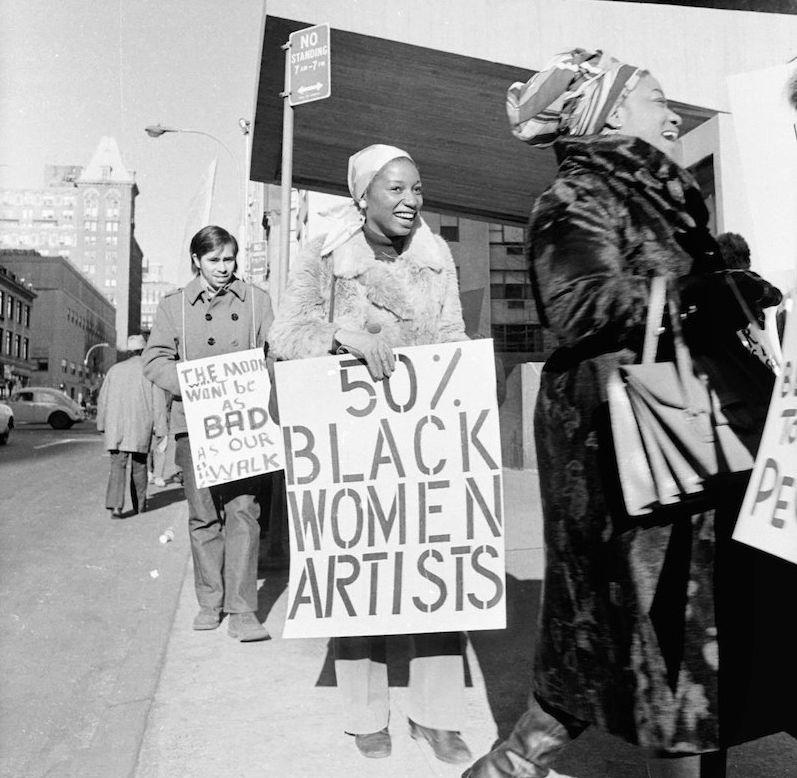 Jan van Raay's photo of Faith Ringgold (right) and Michele Wallace (middle) at an Art Workers Coalition protest at the Whitney Museum in 1971.