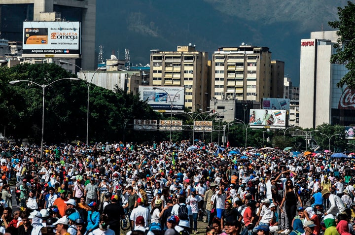 Venezuelan opposition activists demonstrate against President Nicolas Maduro in Caracas, on April 24, 2017.