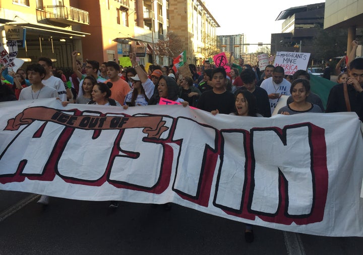 <p>ICE Out of Austin members march during Day Without an Immigrant march in Austin</p>