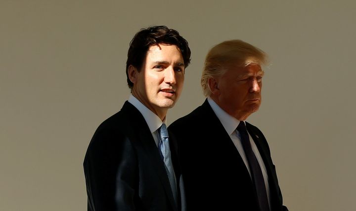 U.S. President Donald Trump and Canadian Prime Minister Justin Trudeau walk from the Oval Office to the Residence of the White House. 