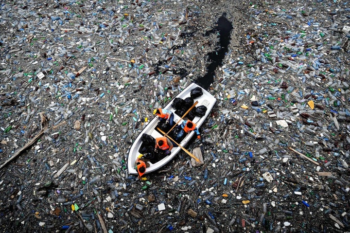 Billions of pounds of plastic waste ends up in the world's waterways like this dam in Bulgaria every year, scientists say.