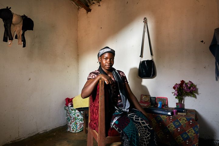 Tamanda (16) sits in her gowelo, Thyolo District, Malawi, 2016. After her mother passed away in 2007, Tamanda was sent to a local orphanage, where she still lives. She rents out her gowelo in order to earn some extra income. When she graduates, Tamanda wants to become a biology or English teacher. 
