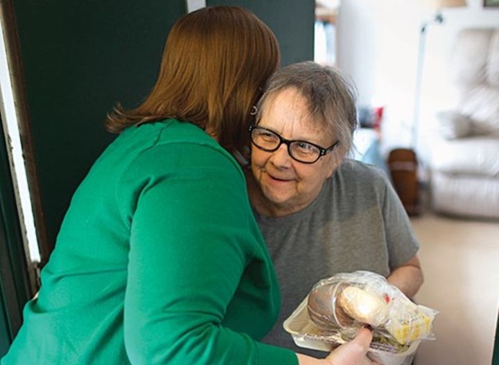 Meals on Wheels deliveries can help seniors remain at home. Bread for the World/Flickr, CC BY 