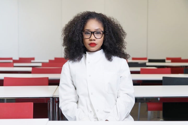 <p>The author, looking fierce in her lab coat. </p>