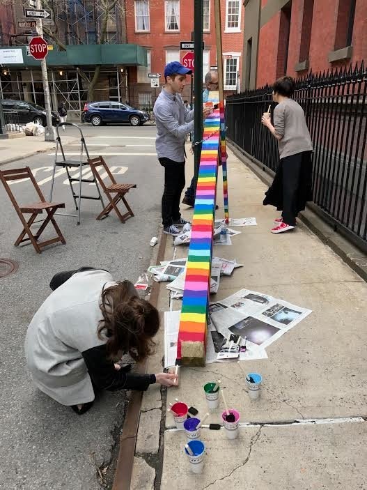 Neighbors and friends all joined in on the painting. 