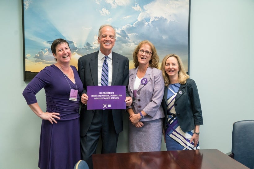 Advocates Heather and Charlotte Garrett, and Senator Jerry Moran of Kansas with PanCAN president and CEO Julie Fleshman at Na
